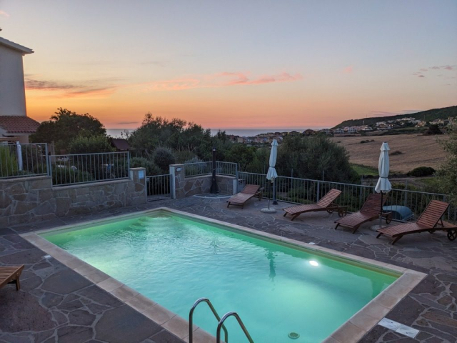 Swimming pool at sunset